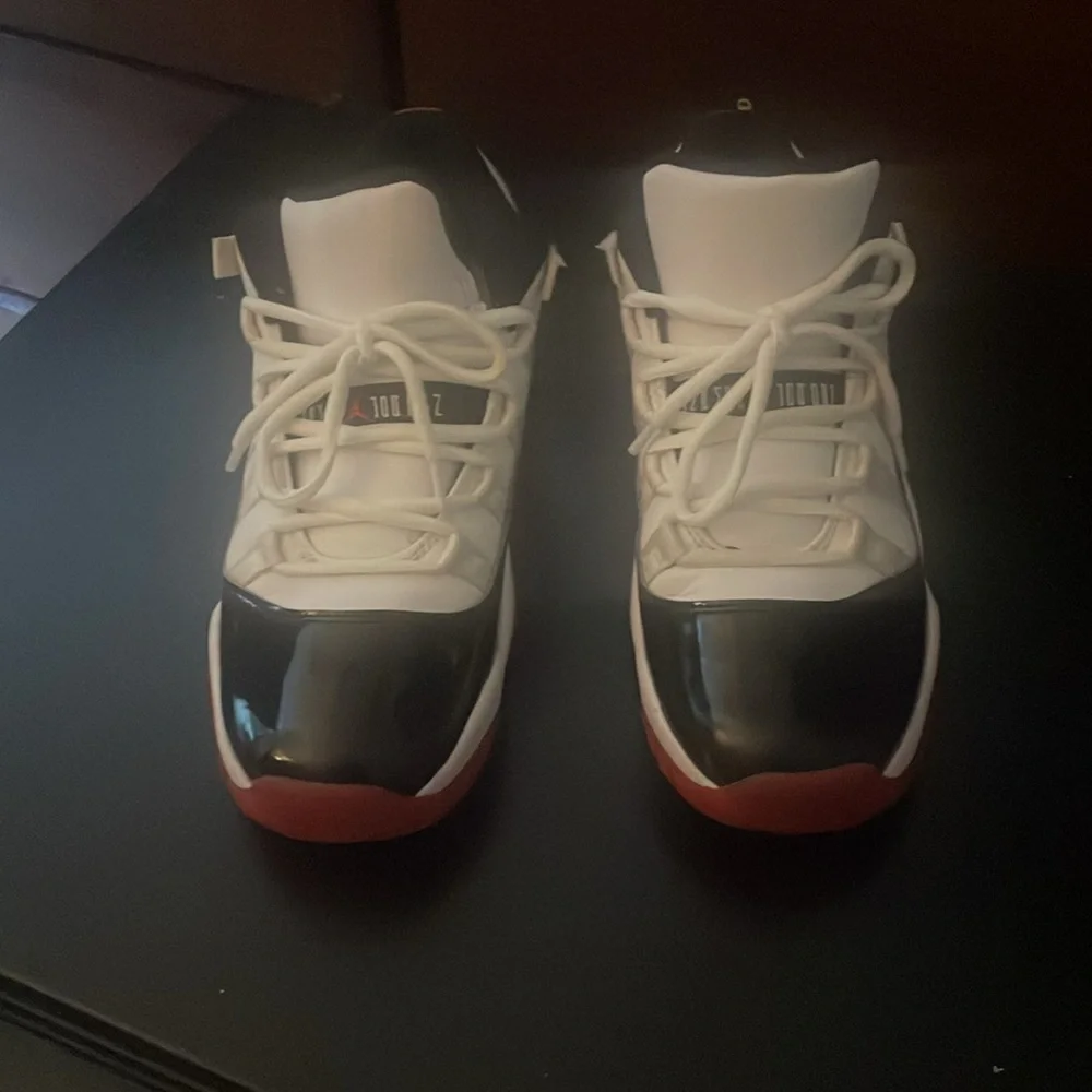 They are Jordan’s size 7y black an white with red bottoms. - Picture 2 of 3
